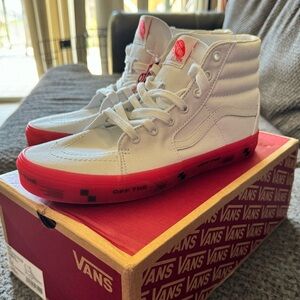 White / Pink high top Vans